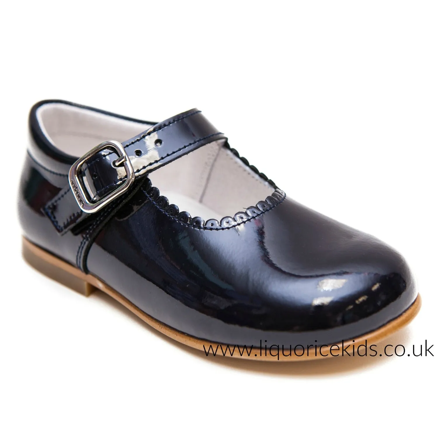 Andanines Girls Navy Blue Patent Mary Janes With Scallop Edging.